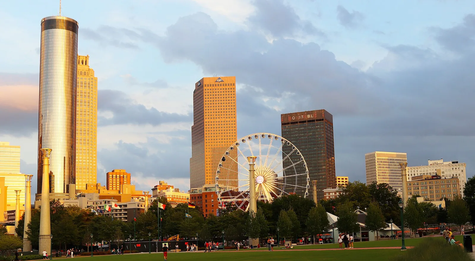 Centennial Olympic Park and the SkyView Ferris wheel against the downtown Atlanta skyline.