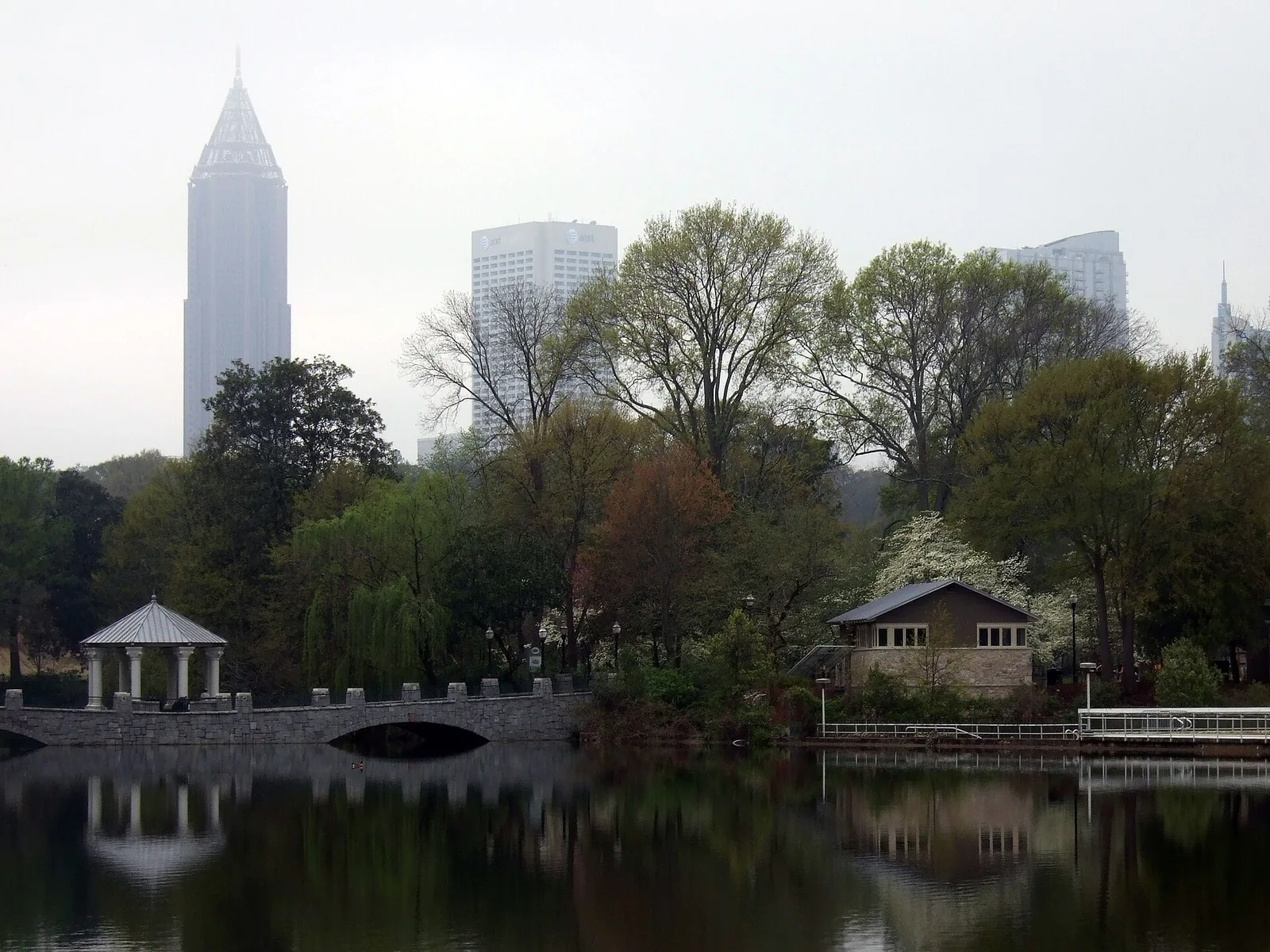 Piedmont Park in spring, with the Midtown Atlanta skyline behind.