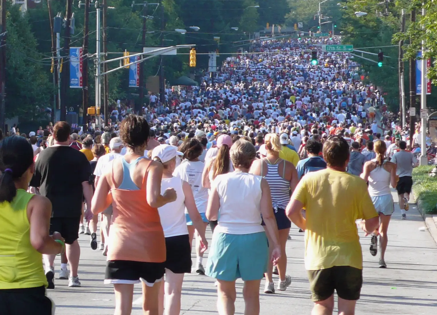 Runners fill Peachtree Street from curb to curb during the Peachtree Road Race.