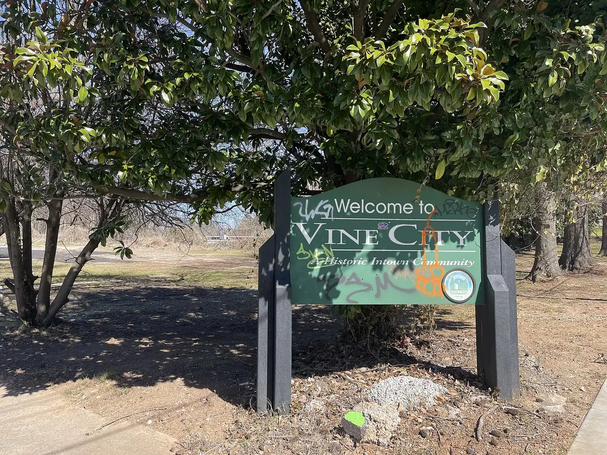 The Vine City neighborhood sign at Griffin Street and Martin Luther King Jr. Drive
