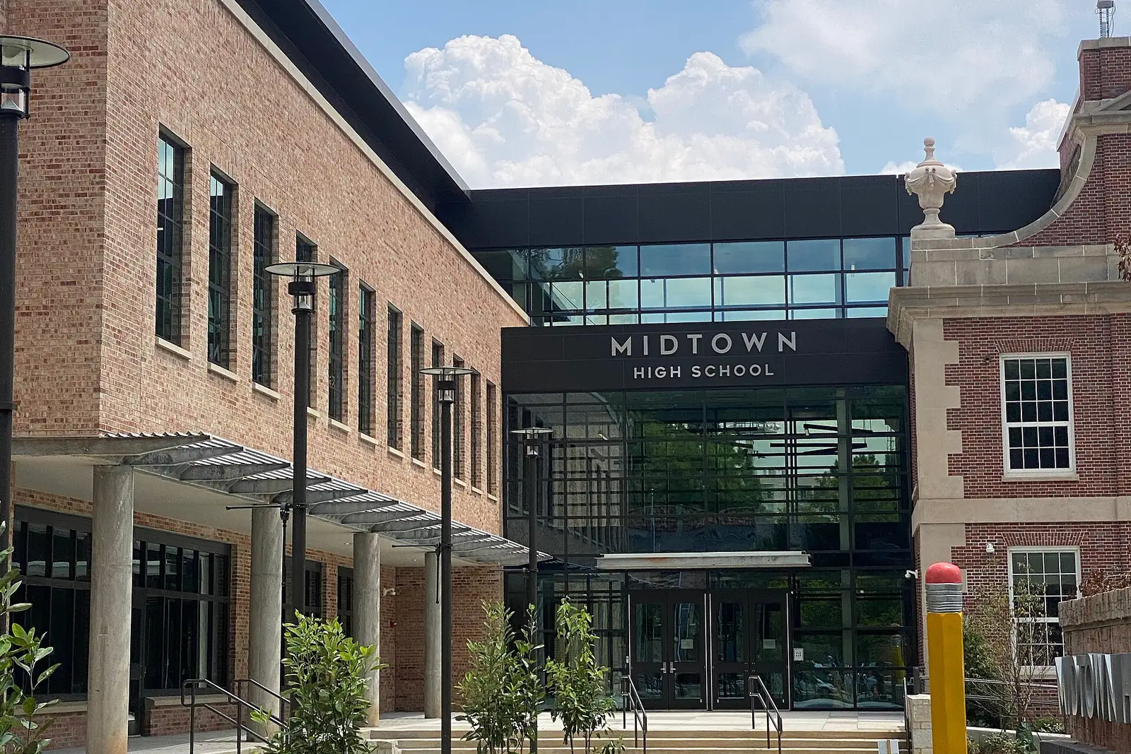 Midtown High School at 10th Street and Charles Allen Drive, across from Piedmont Park